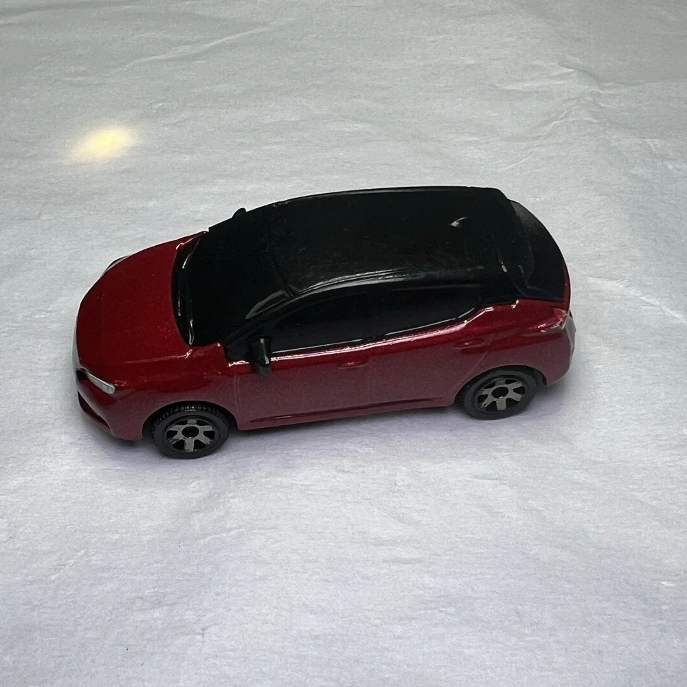 MATCHBOX 2022 MBX ELECTRIC DRIVERS EXCLUSIVE 2018 NISSAN LEAF METALLIC RED Loose